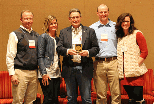 Brubaker Farms received the 2014 Pacesetter Award, represented by Mike, Lisa, Luke, Tony and Rebecca Brubaker.